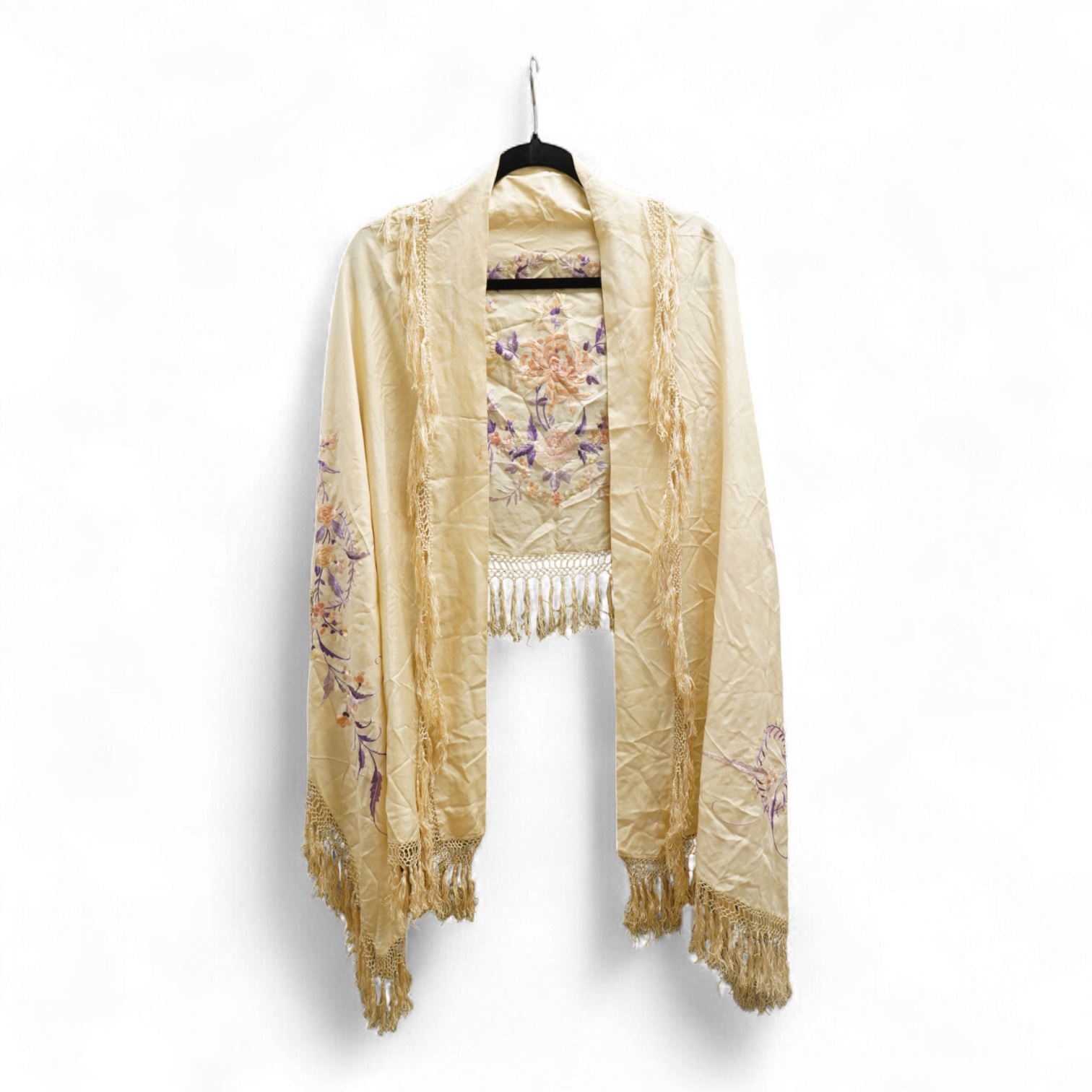 A 19th century Chinese cream silk embroidered and fringed stole, converted to a cape. Embroidered in pastel pinks and lilacs.192cm long